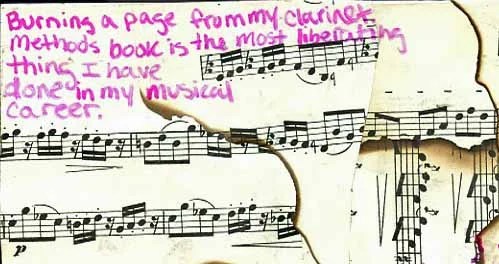The front features musical notes with handwritten text in pink.