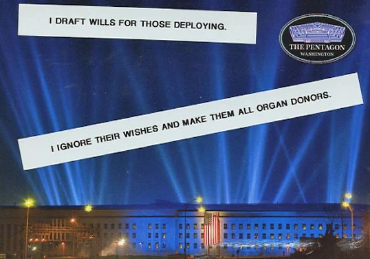 A photo of the Pentagon illuminated at night with blue lights.