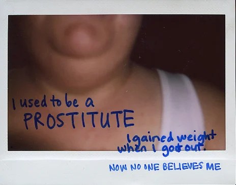A close-up photo of a person's neck and chin with handwritten text overlay.