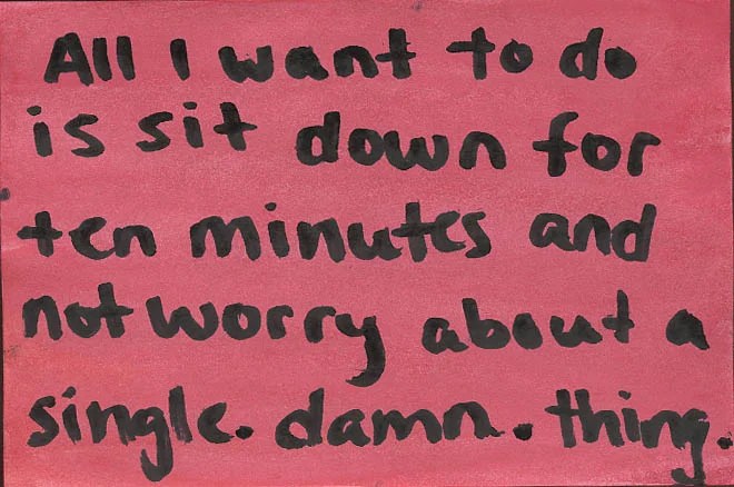 A simple, handwritten message on a red background.