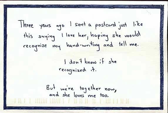 A handwritten note on a postcard with a simple border.