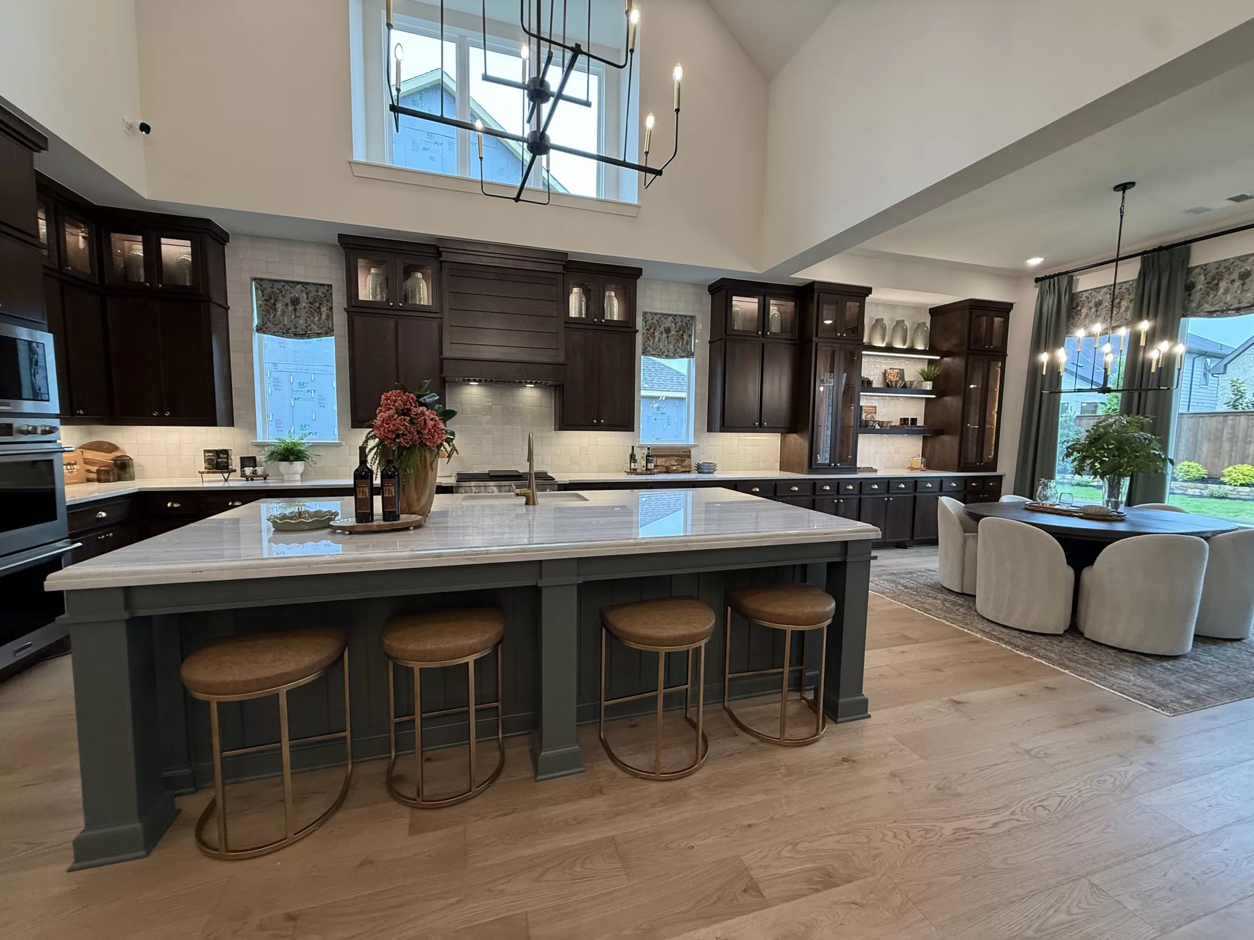 Highland Homes Furst Ranch Flower Mound TX model home exterior with stone, brick, and modern farmhouse architecture.