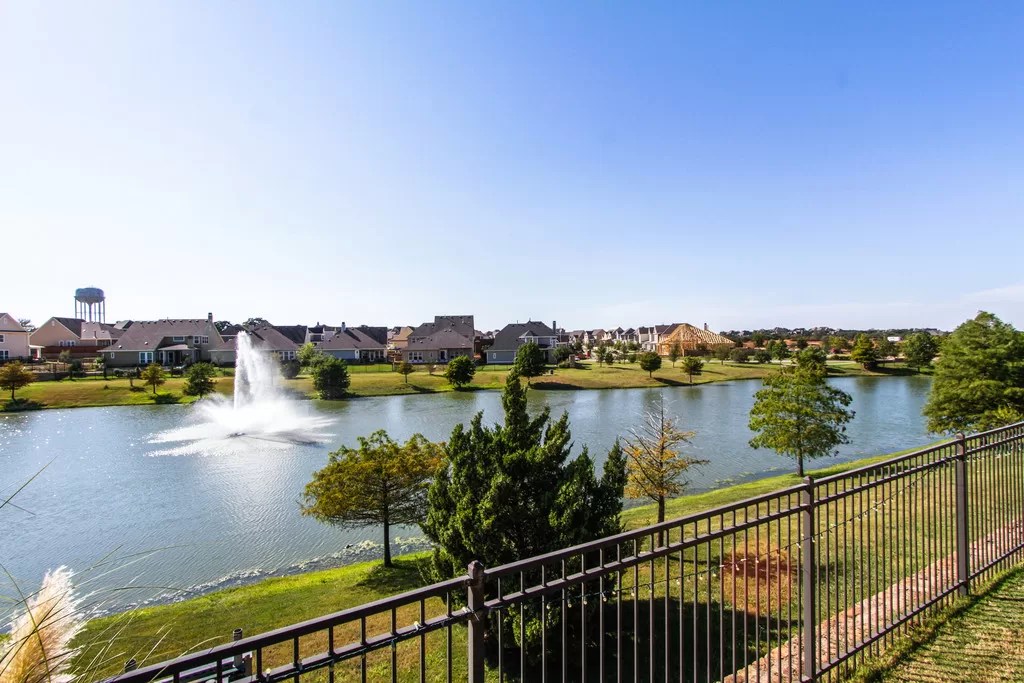 Pond view from the backyard of a sold Fairlin home in Lantana TX
