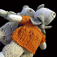 Nallar med stickade kläder