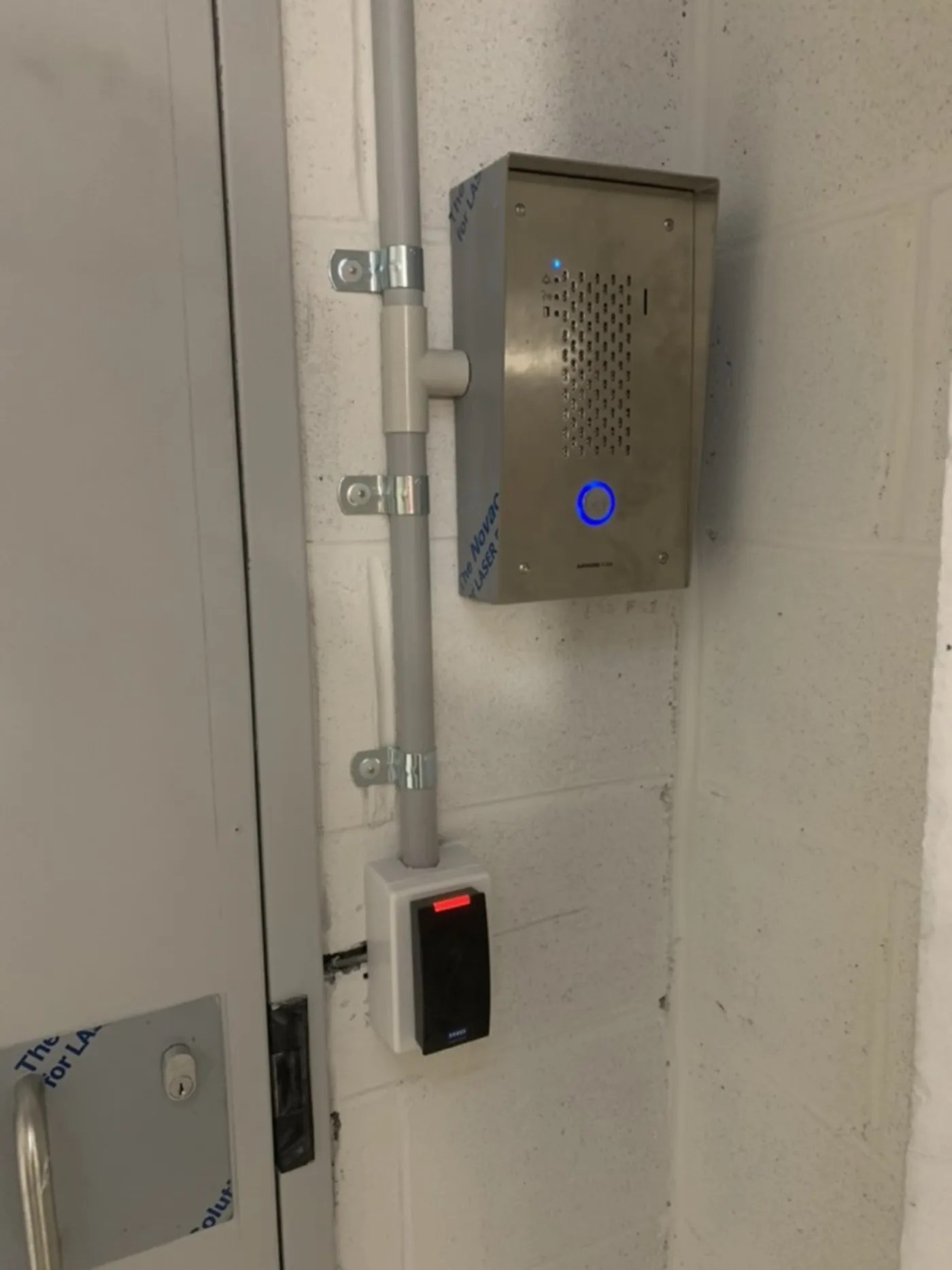 Stainless steel intercom and access reader installed by Security Response Sydney at a secure entry
