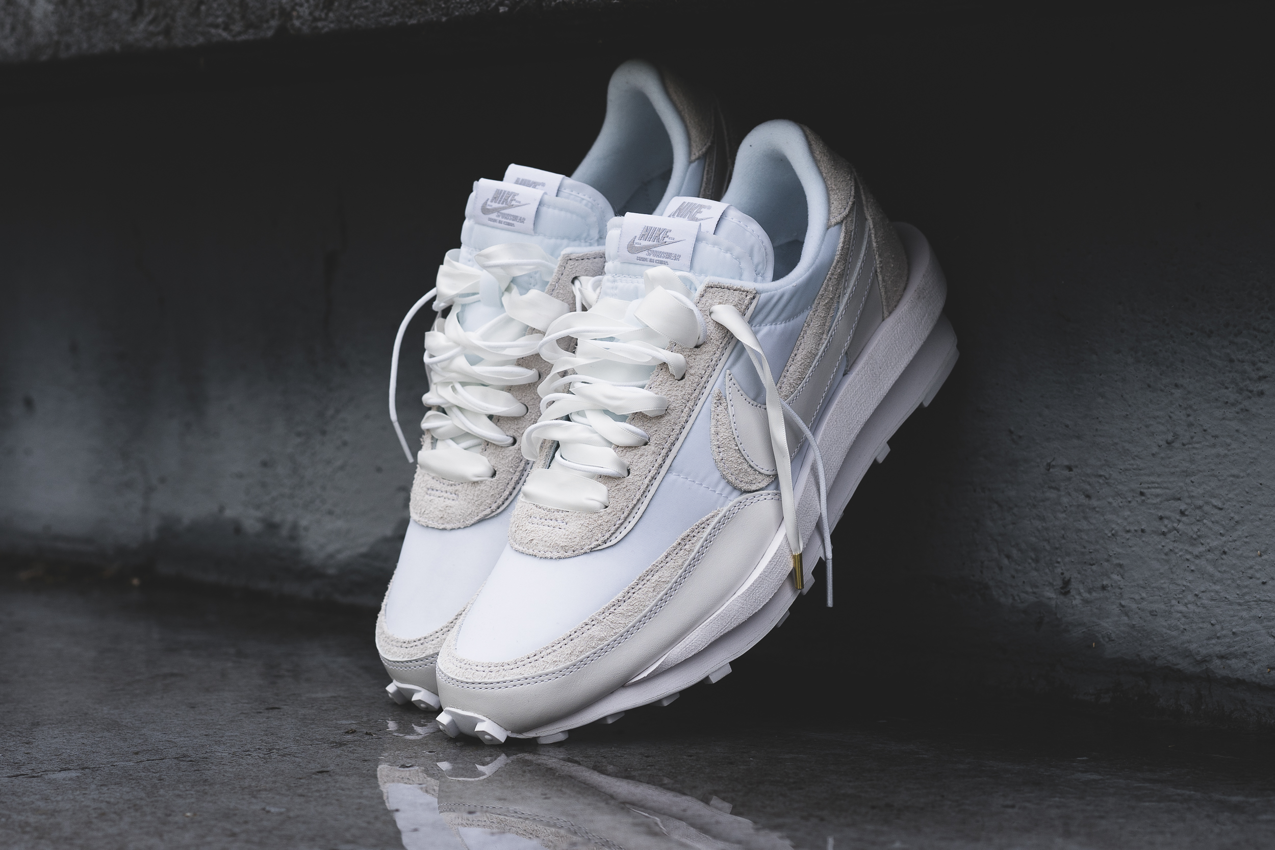 sacai white nylon on feet