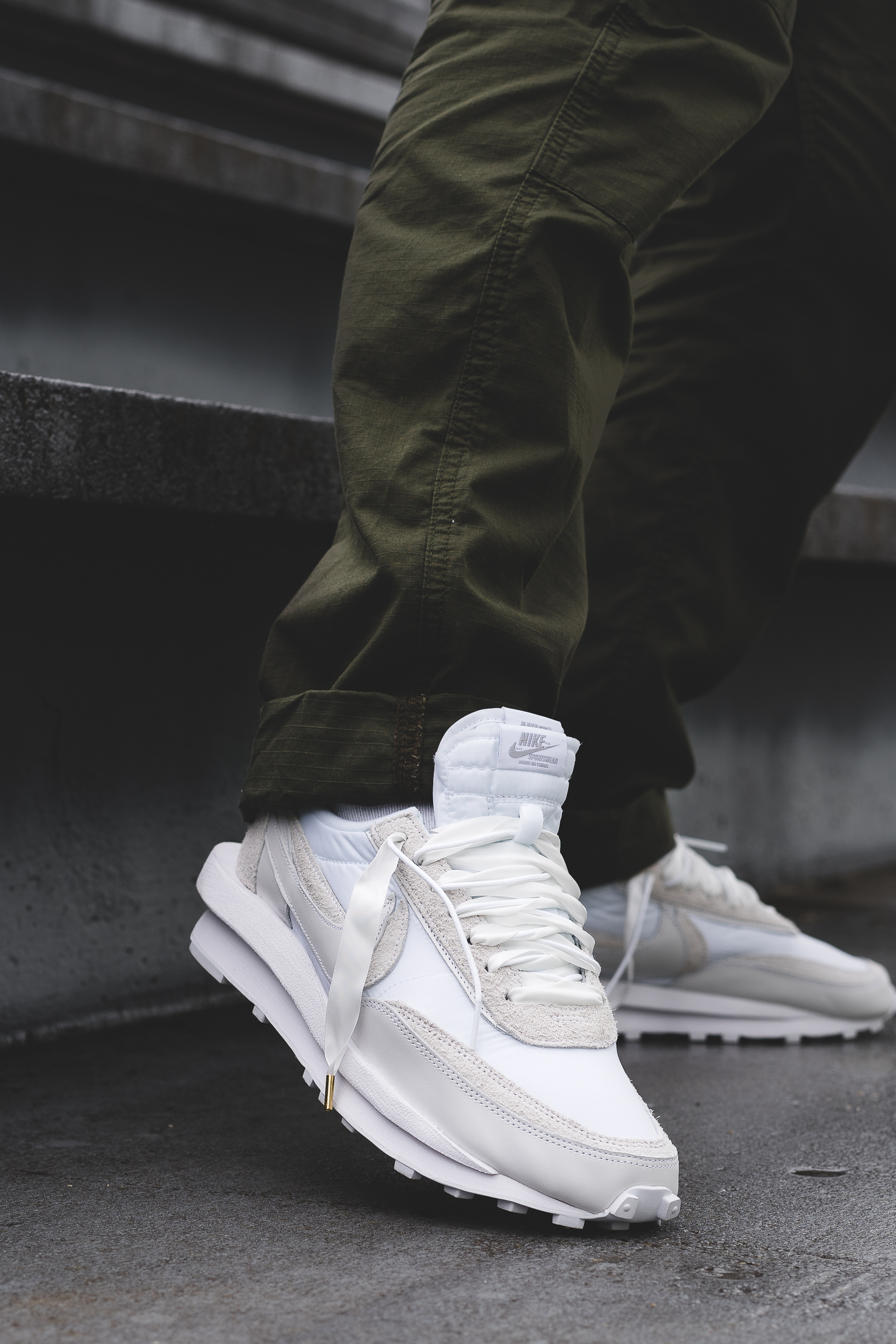 nike sacai white nylon on feet