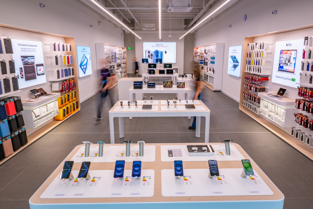 Interior of a Select store showing Mac and business displays
