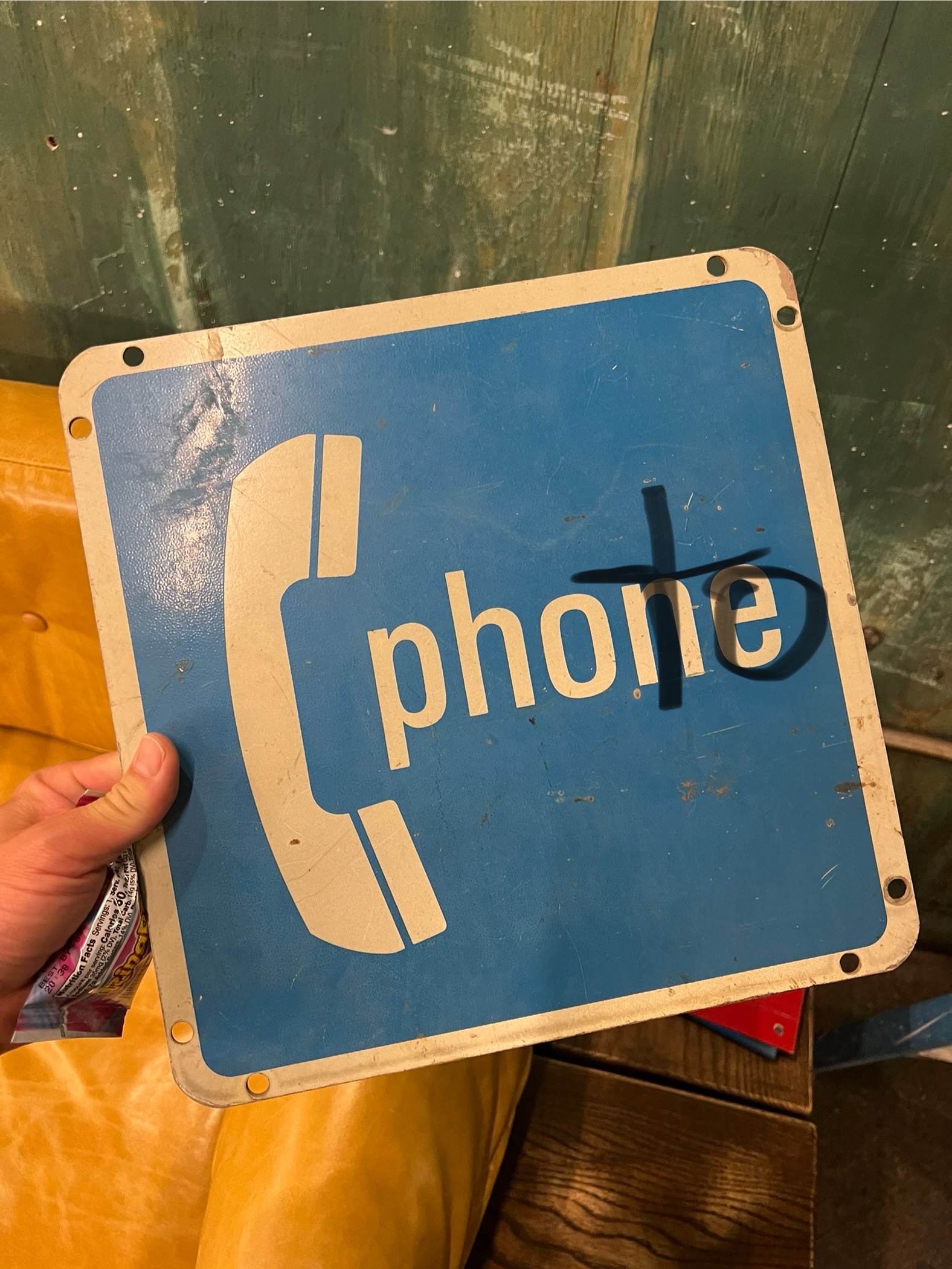 "Phone" sign sharpied to read "photo"