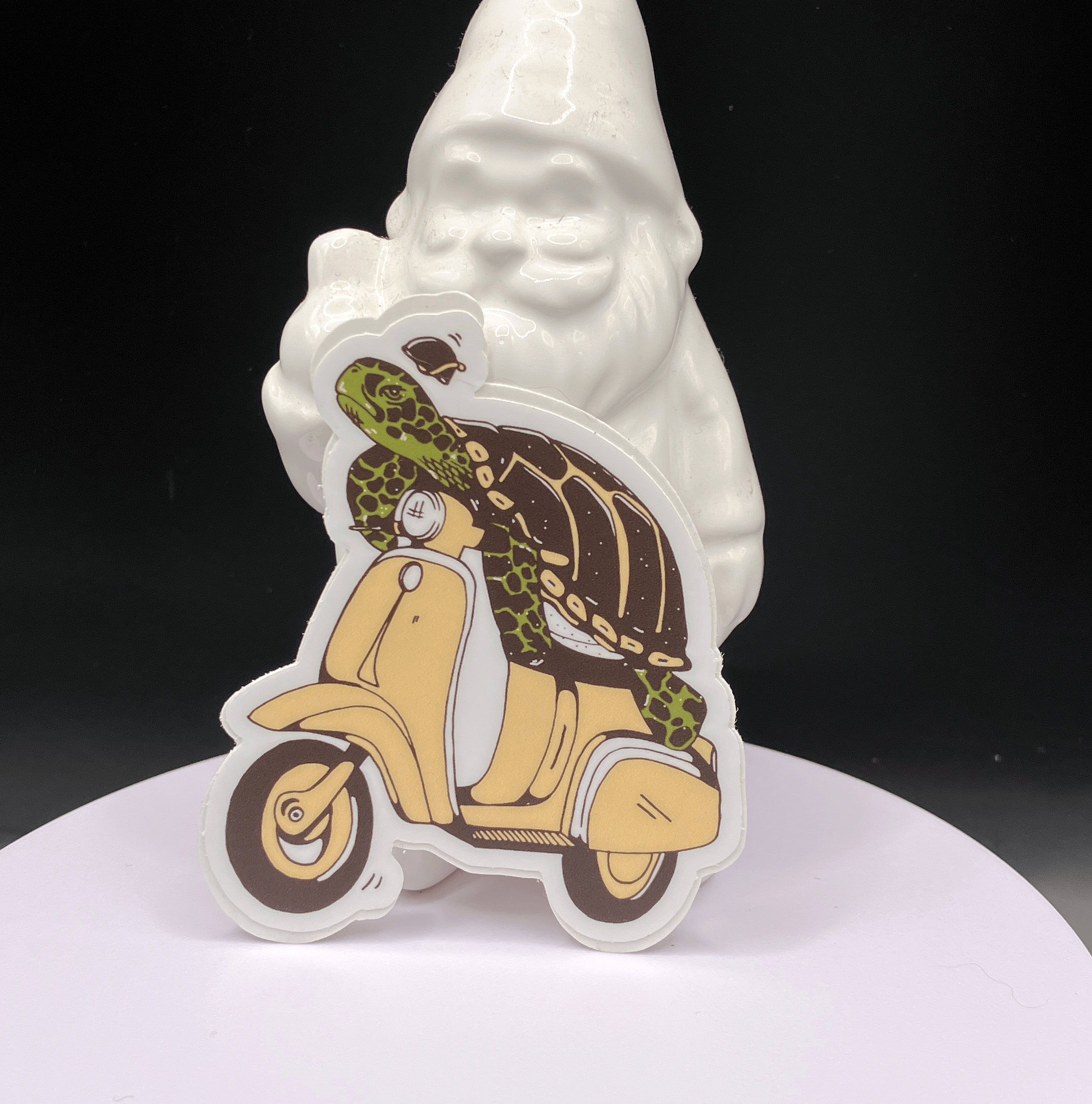 Funny turtle on a moped vinyl sticker artwork