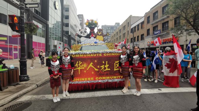 华人社区踊跃参加蒙特利尔庆祝加拿大156周年国庆大游行