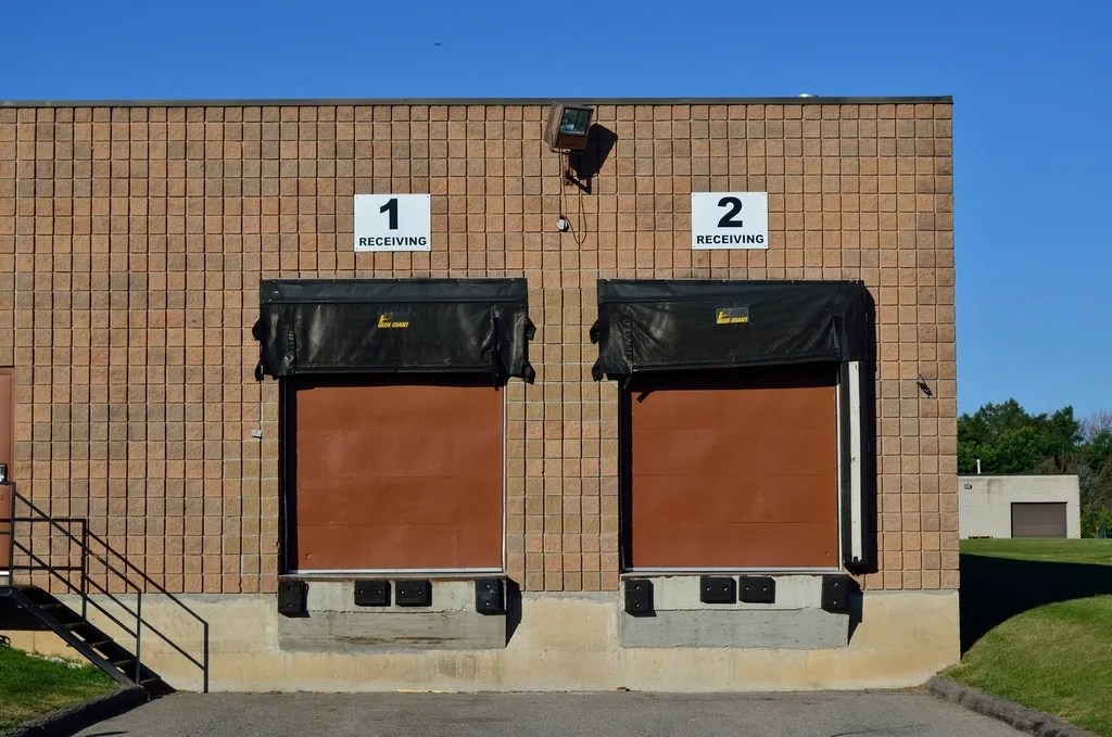 Numbered receiving bays on a commercial loading dock