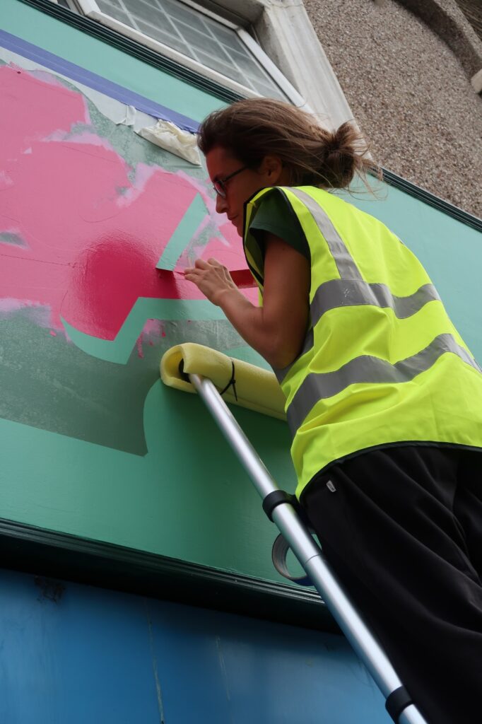 NGS Seraina at work, sign writing london shop fascia tools NGS