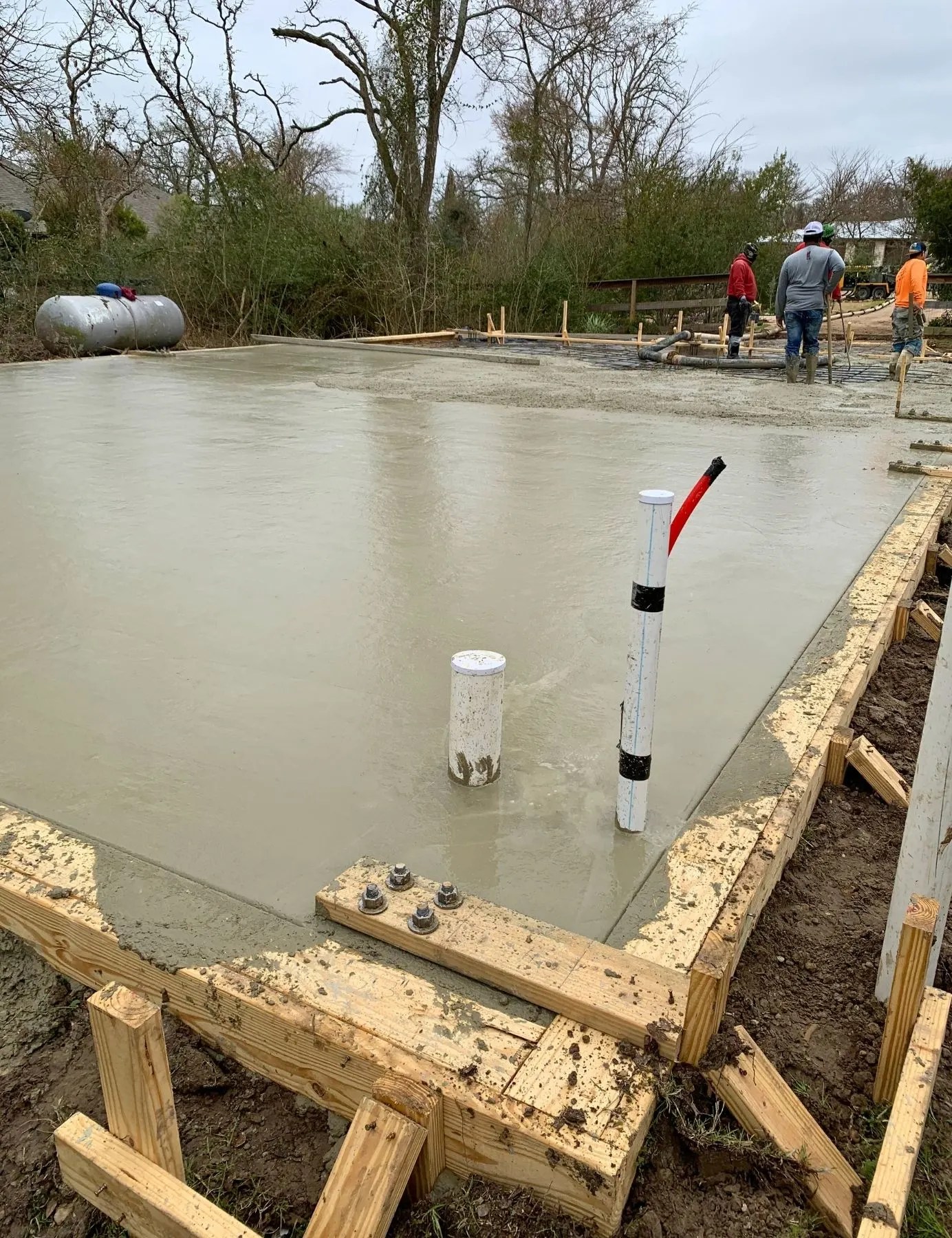 a freshly poured concrete foundation
