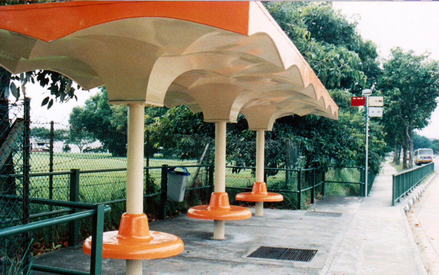 The orange top old bus stop that is rarely seen today