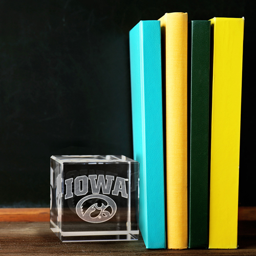 Books on blackboard background