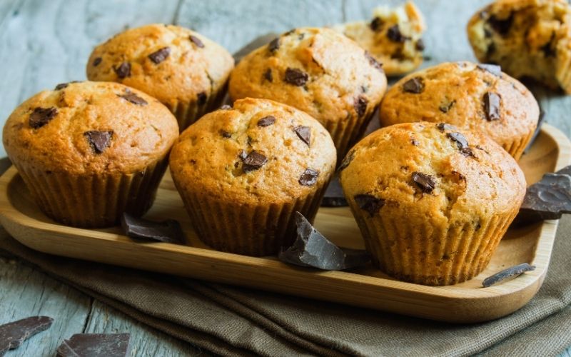 chocolate chip zucchini muffins in the muffin tins