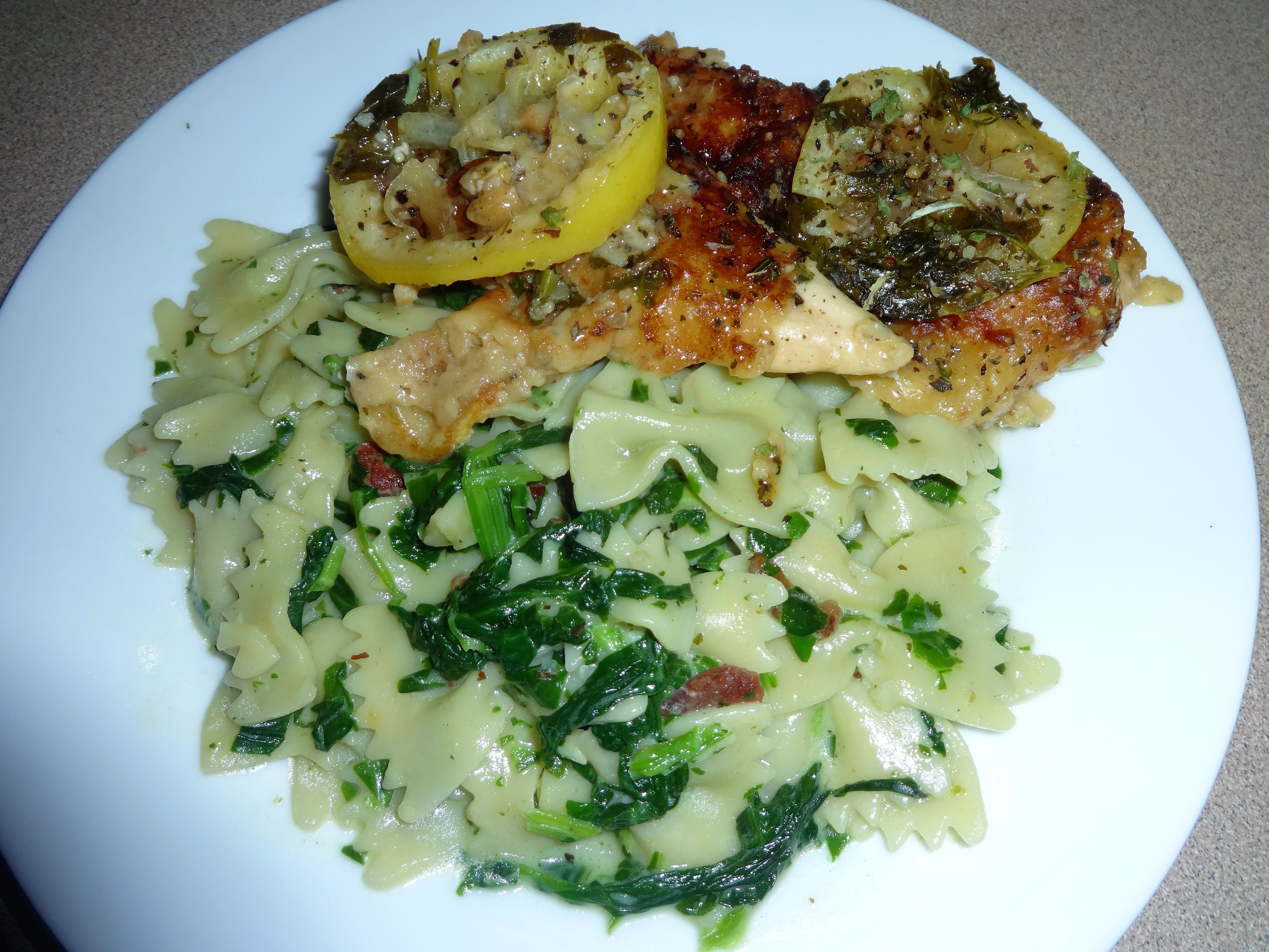 Chicken Francese W pasta in a spinach cream Sauce