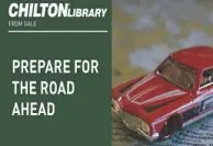 Promotional graphic for ChiltonLibrary. The image is divided into two sections. On the left, a dark green panel displays the ChiltonLibrary logo with the text “FROM GALE” and the slogan “PREPARE FOR THE ROAD AHEAD” in bold white letters. On the right, a close-up photograph shows a red model car resting on top of a road map. The image promotes ChiltonLibrary’s automotive repair, maintenance, and vehicle information resources.