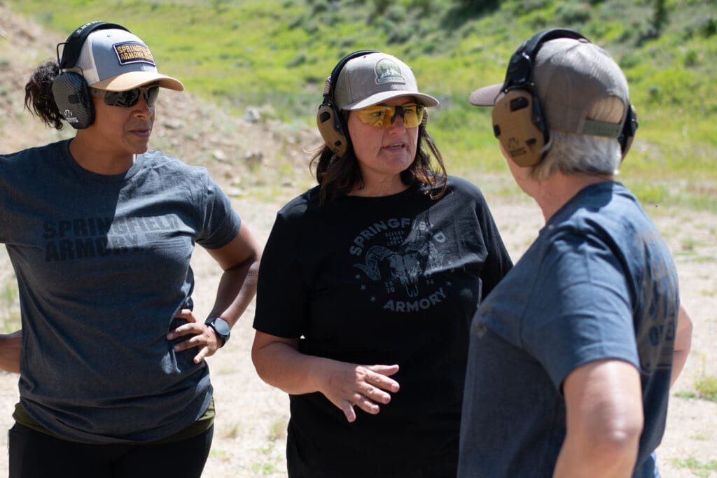 women at a gun range