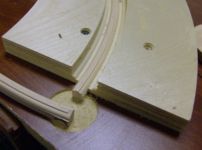 Close-up photo of the same setup as the laminate surfacing jig but with the curved side of design facing up.