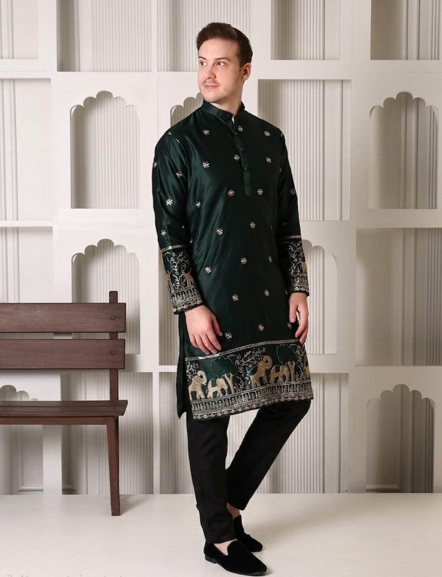 Man wearing dark green silk embroidered kurta with elephant motif border and black pyjama - Shrobh