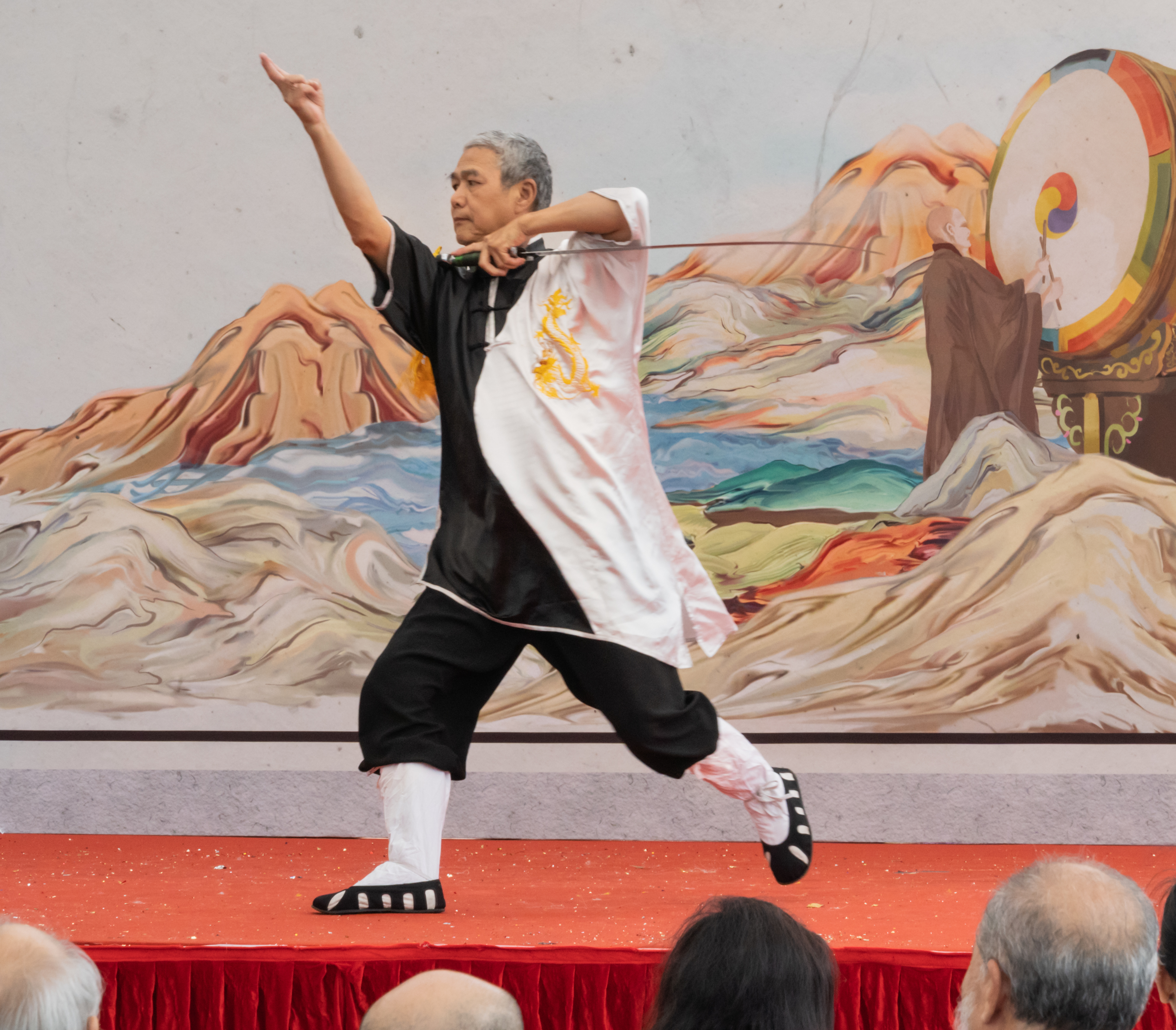 A man performing Chinese traditional swordsmanship