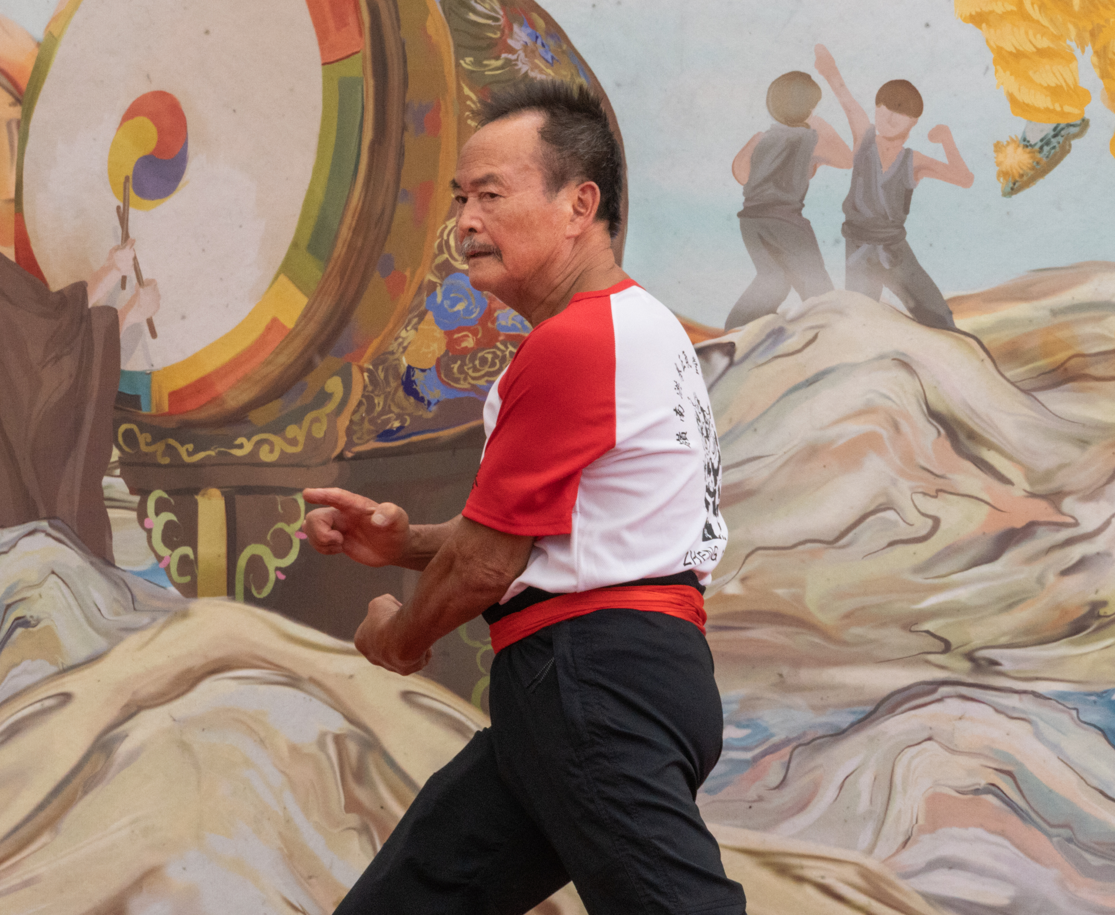 Man performing special Chinese traditional fist position.