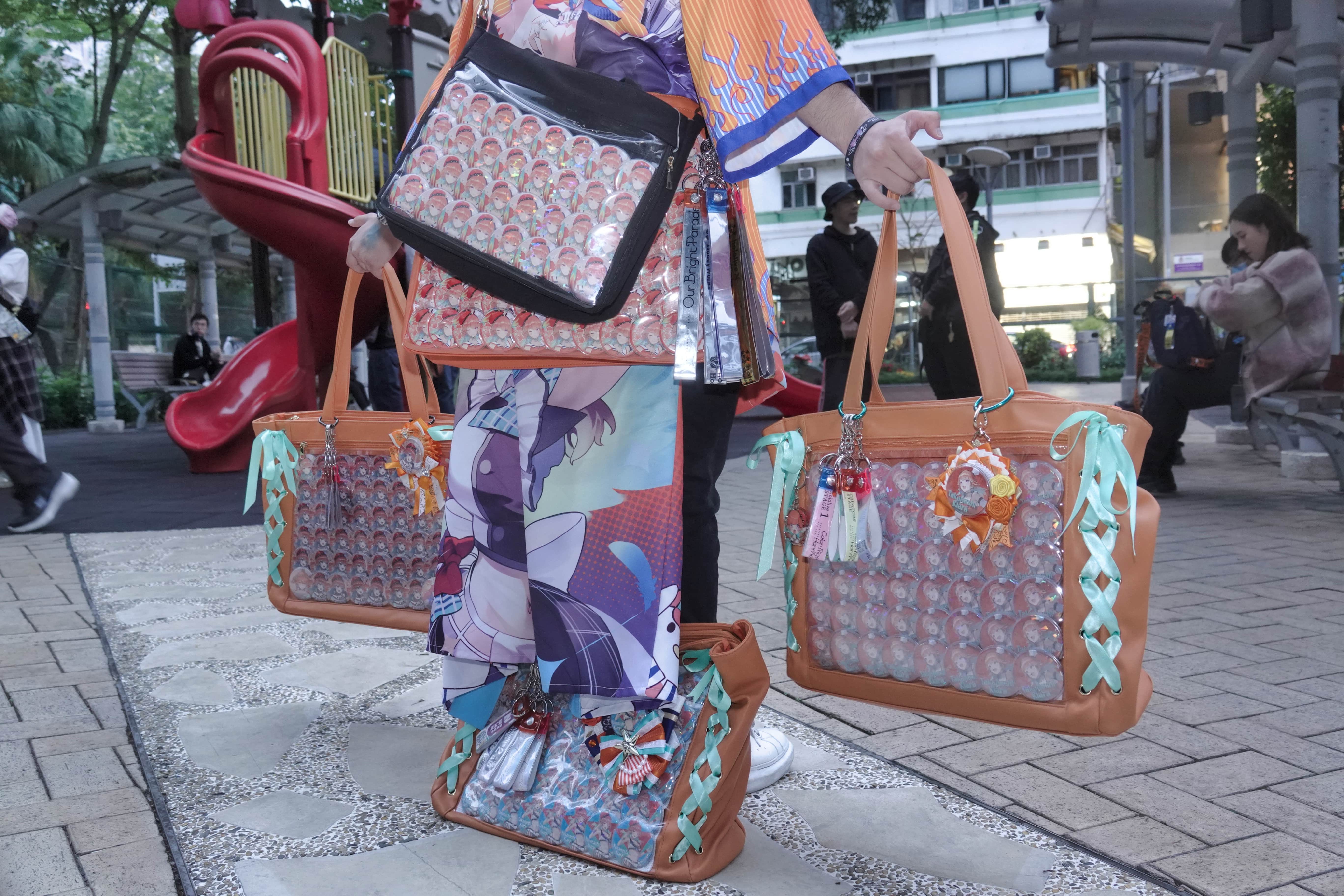 William Choi displaying all his merchandise of Kiara he had brought to the event