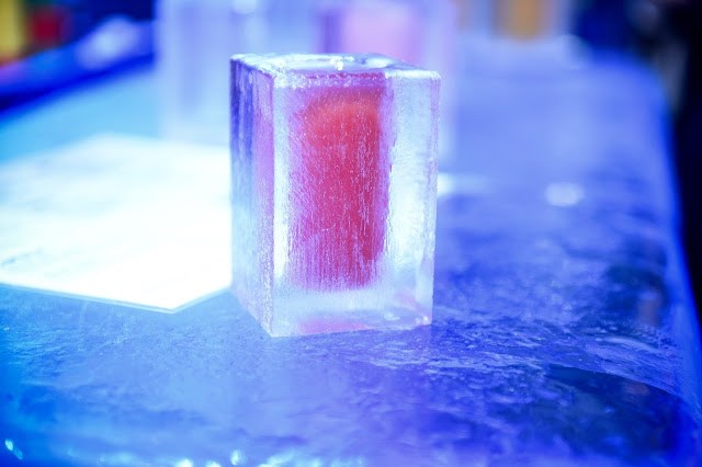 cocktail in glass made of ice at IceBar London