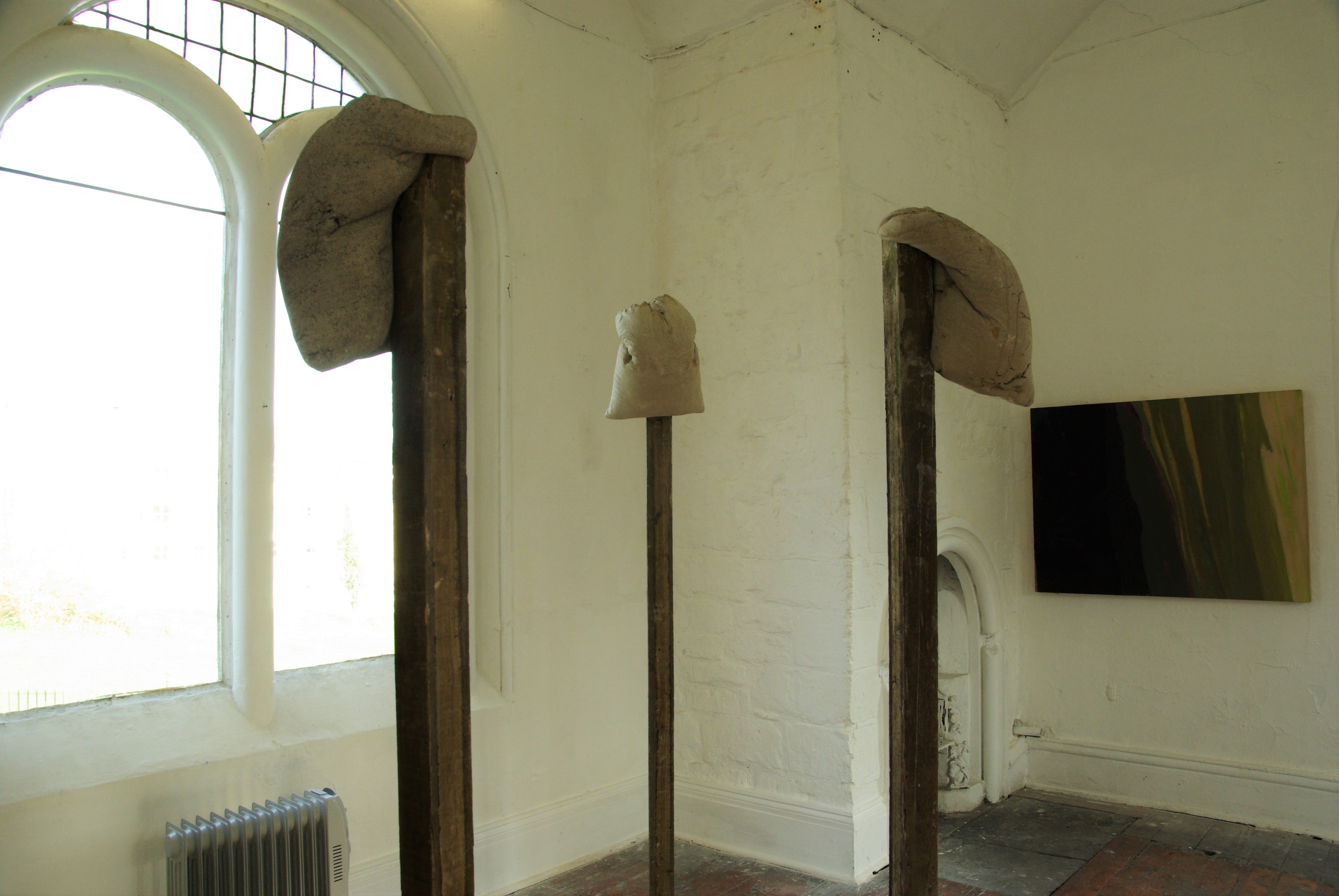 Wayne Elkins, 'Hang', wood and concrete 2015; Clare Thatcher, 'Spar Cave, Isle of Skye (entrance), oil on wood and burlap, 2015