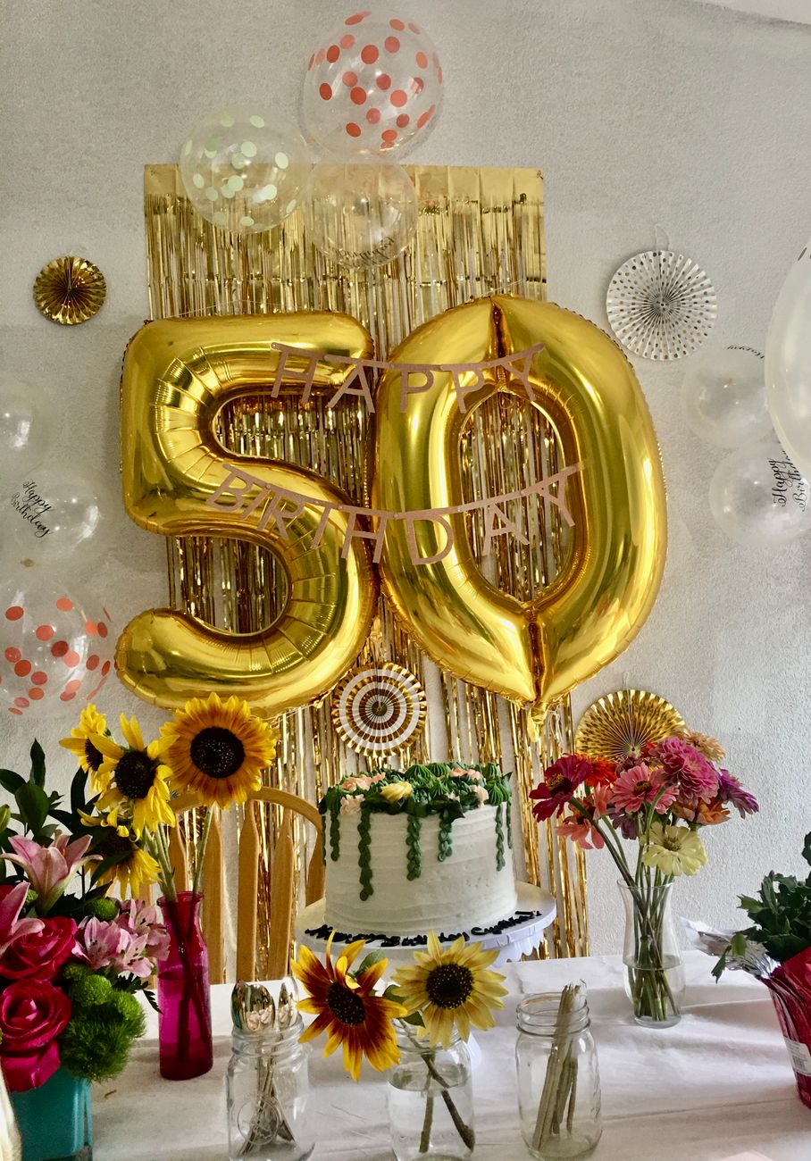 gold balloons on a wall