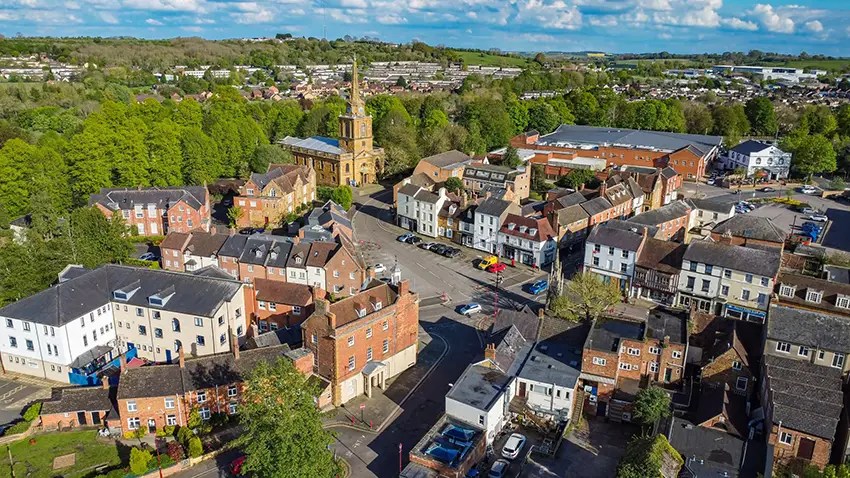 Aerial view of Daventry town centre and Holy Cross Church, covered by Simple Removals & Logistics Daventry removals