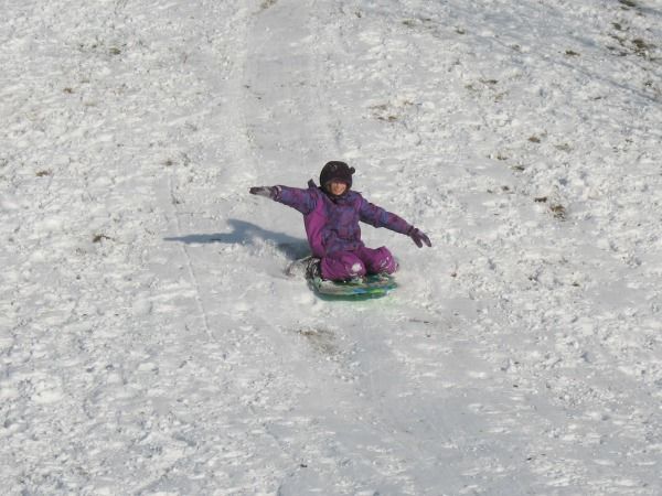 Miss S sledding