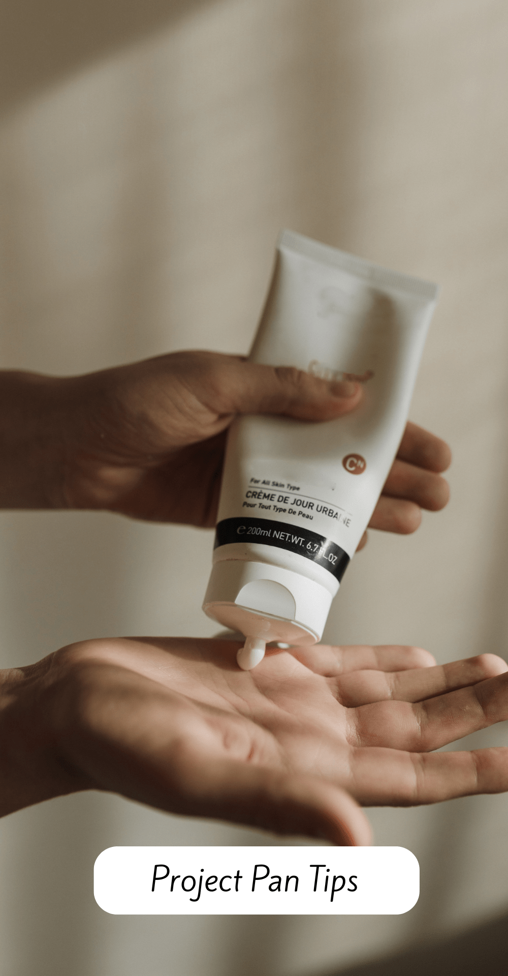 Project Pan Tips. Hands of someone using up some cream.