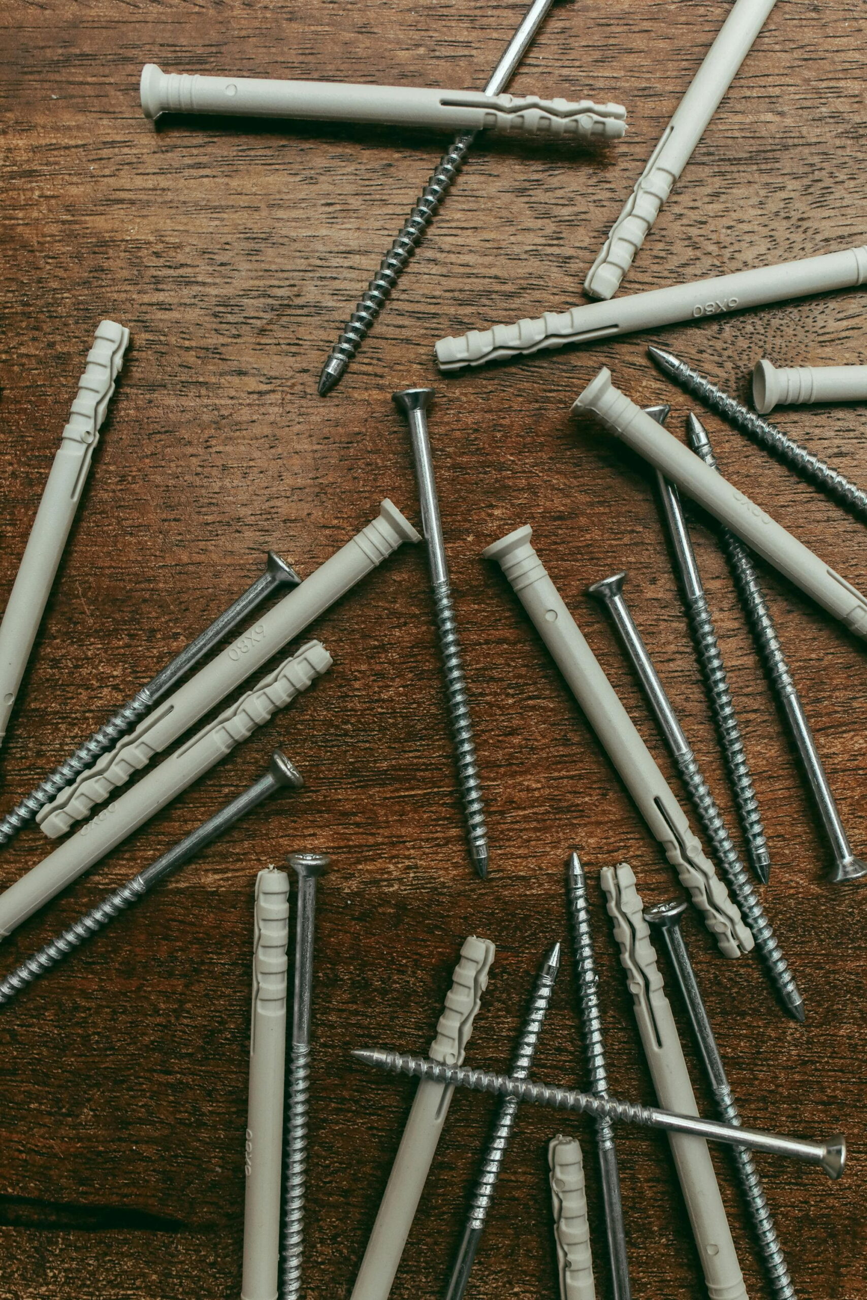 External rendering anchor plugs and screws for long-term weatherproofing strategies