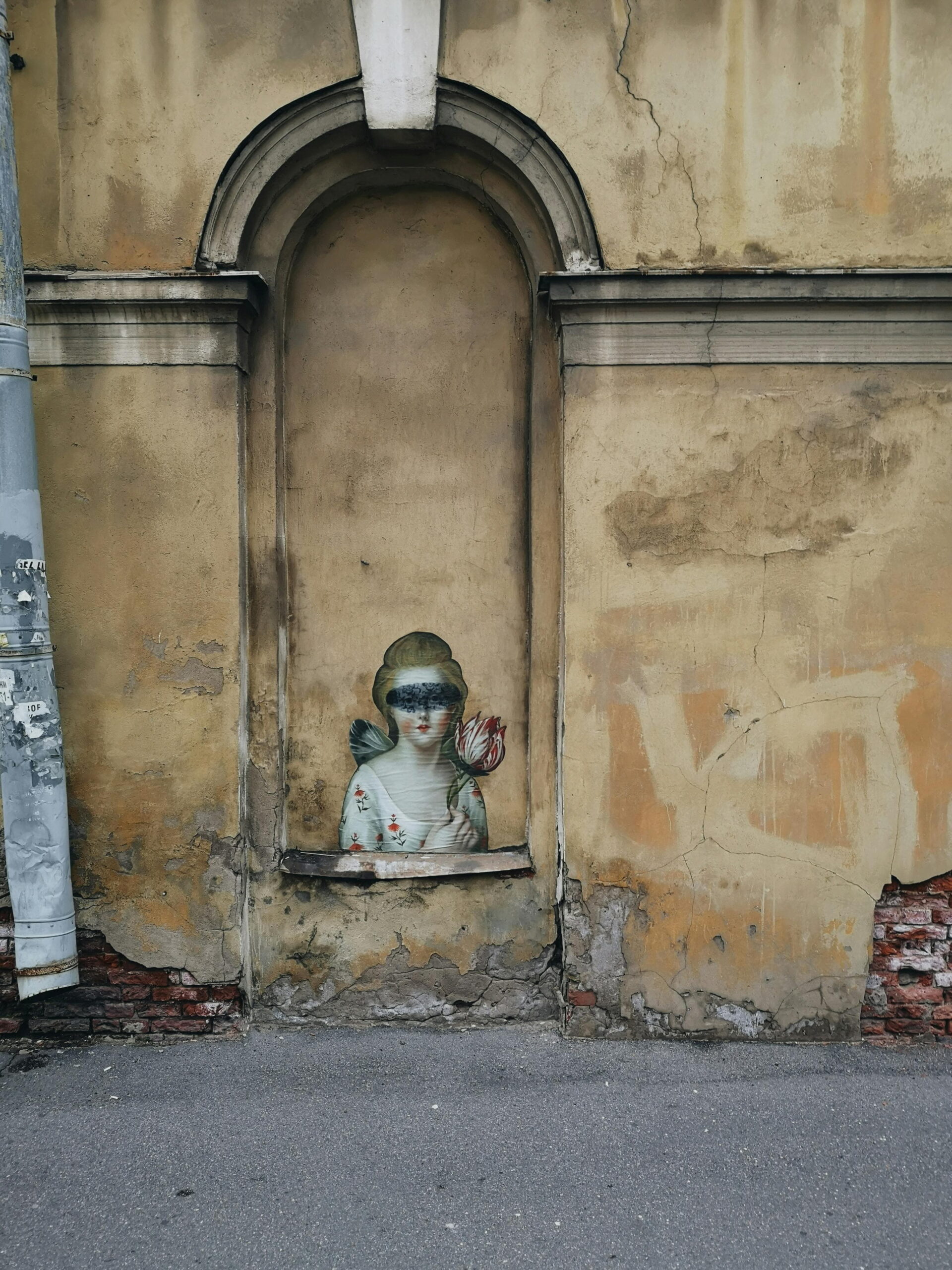 Street art mural on external wall illustrating sustainability benefits of mineral wool EWI