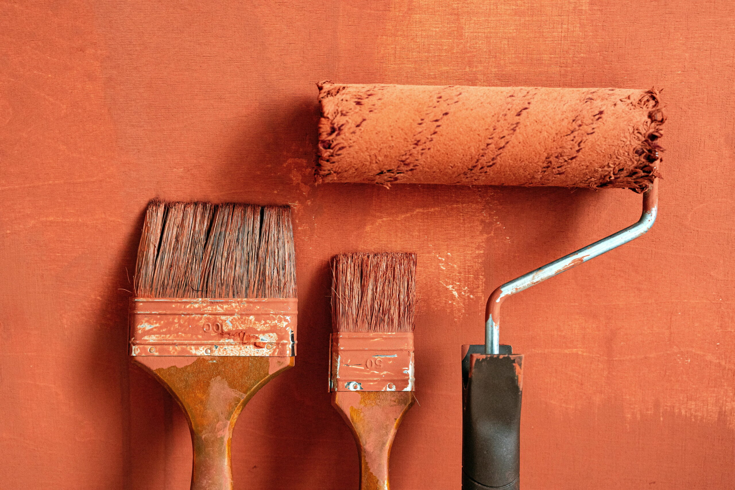 Blue Dolphin hybrid masking tape test demonstrating clean paint lines with brushes and rollers for professional rendering services