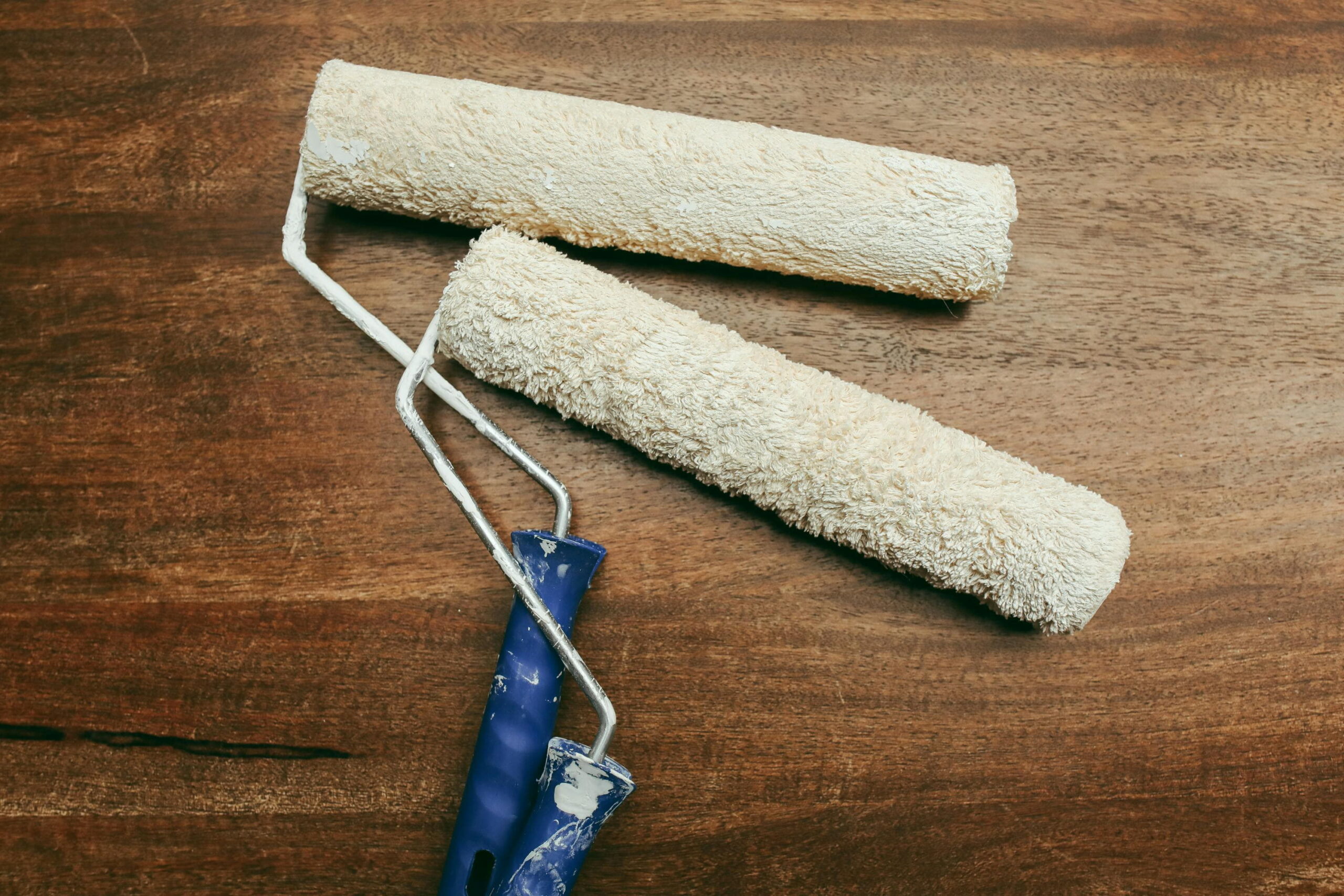 polymer finishing plaster advantages demonstrated with professional rollers for smooth rendering finish by Simple Solution 4 U Ltd