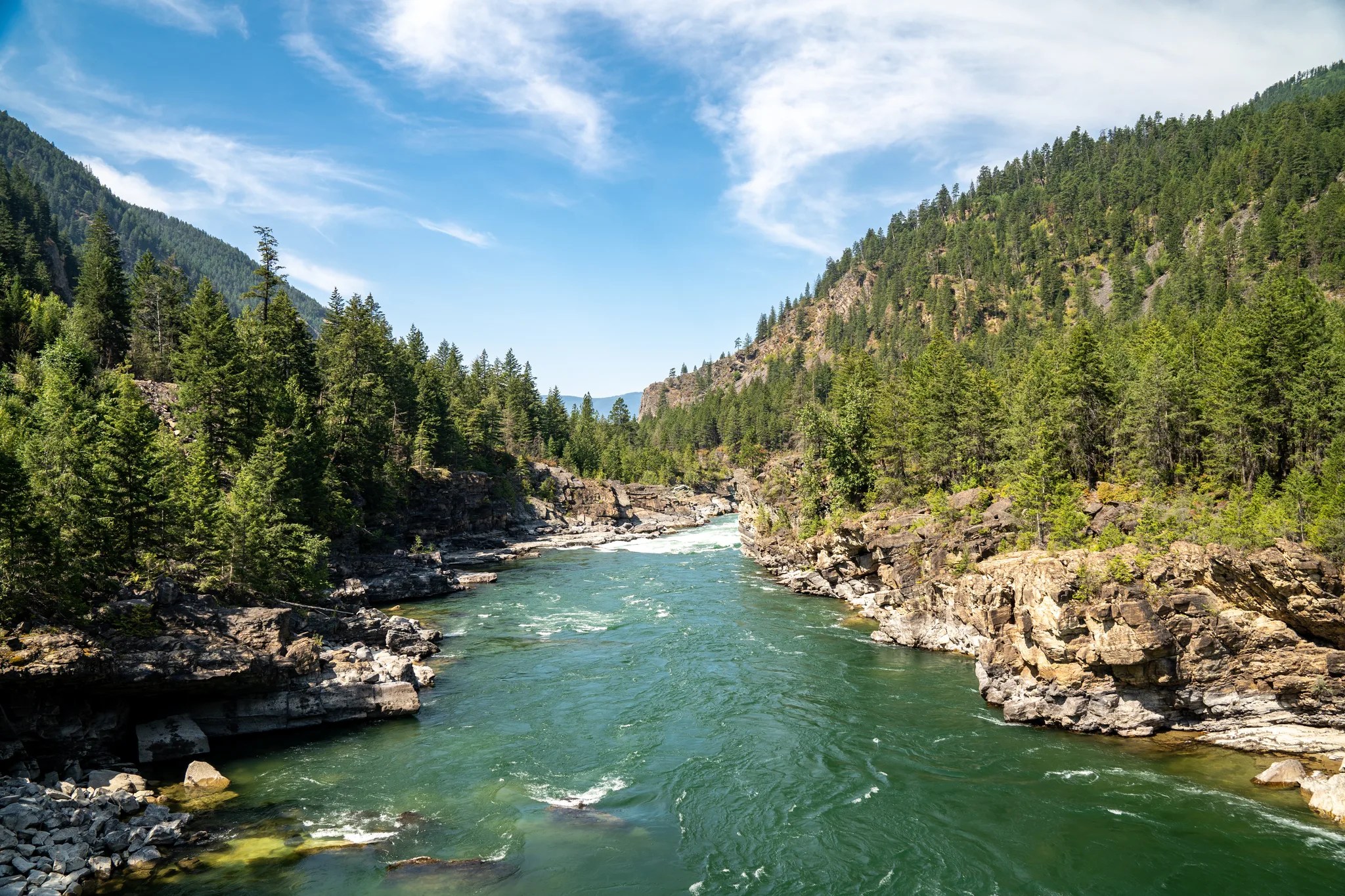 The Kootenai River running green through a rock canyon in the Kootenai National Forest near Libby, Montana