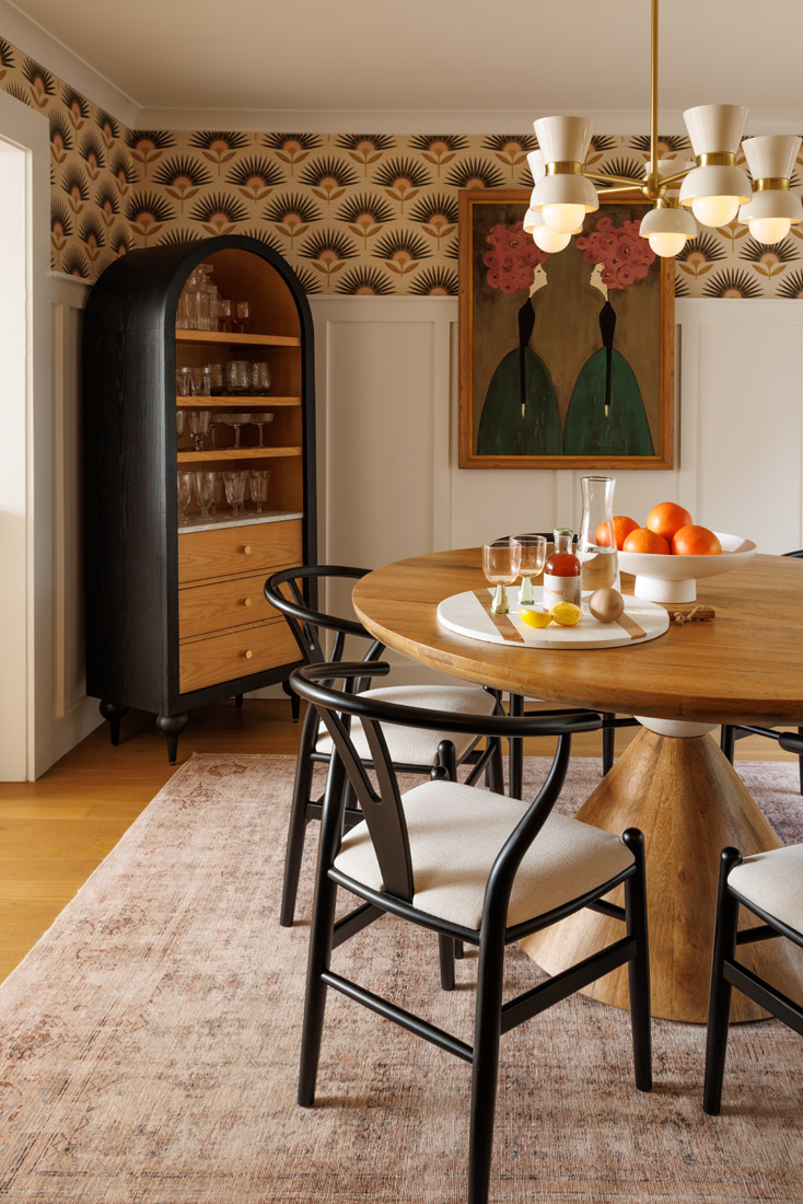 The dining table by Four Hands and an Anthropologie cabinet bring contrast to the dining room.