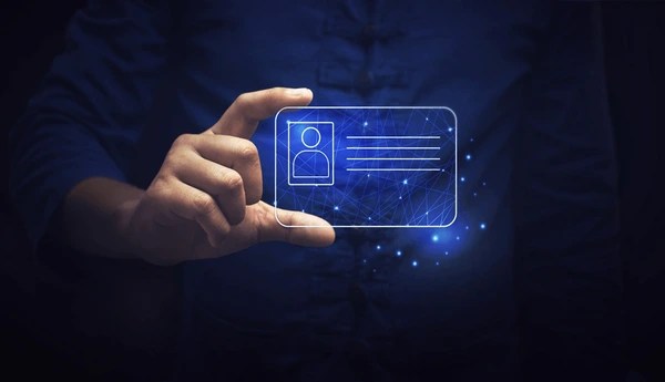 Human hand holding a digital ID card
