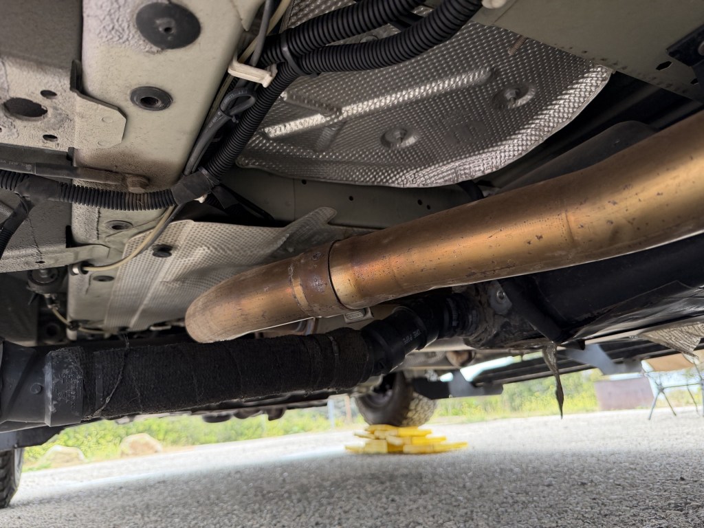 Engine exhaust, gray tank drain Engine exhaust, gray tank drain
