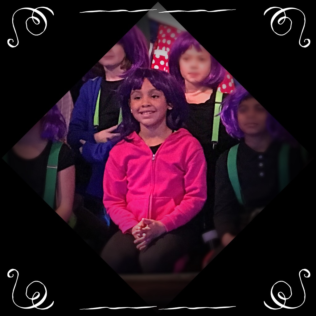 N. singing in Willy Wonka