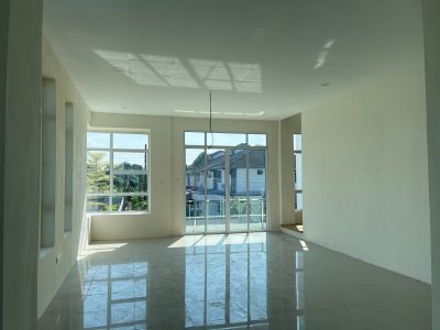 Kitang Heights two storey intermediate terrace house with sub-basement.