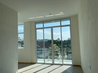 Kitang Heights two storey intermediate terrace house with sub-basement.