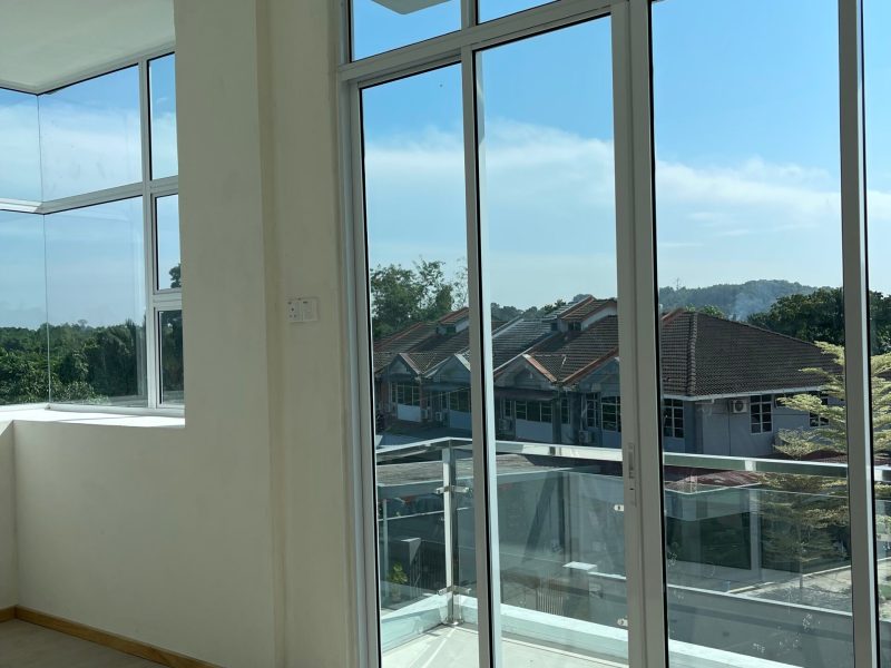 Kitang Heights two storey intermediate terrace house with sub-basement.