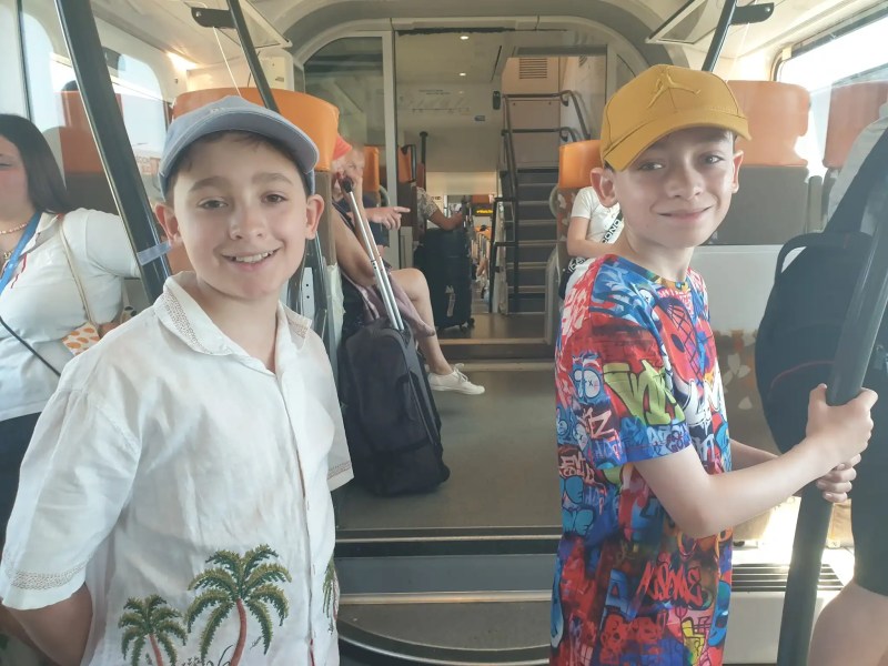 Twins on a train in Nice, French Riviera