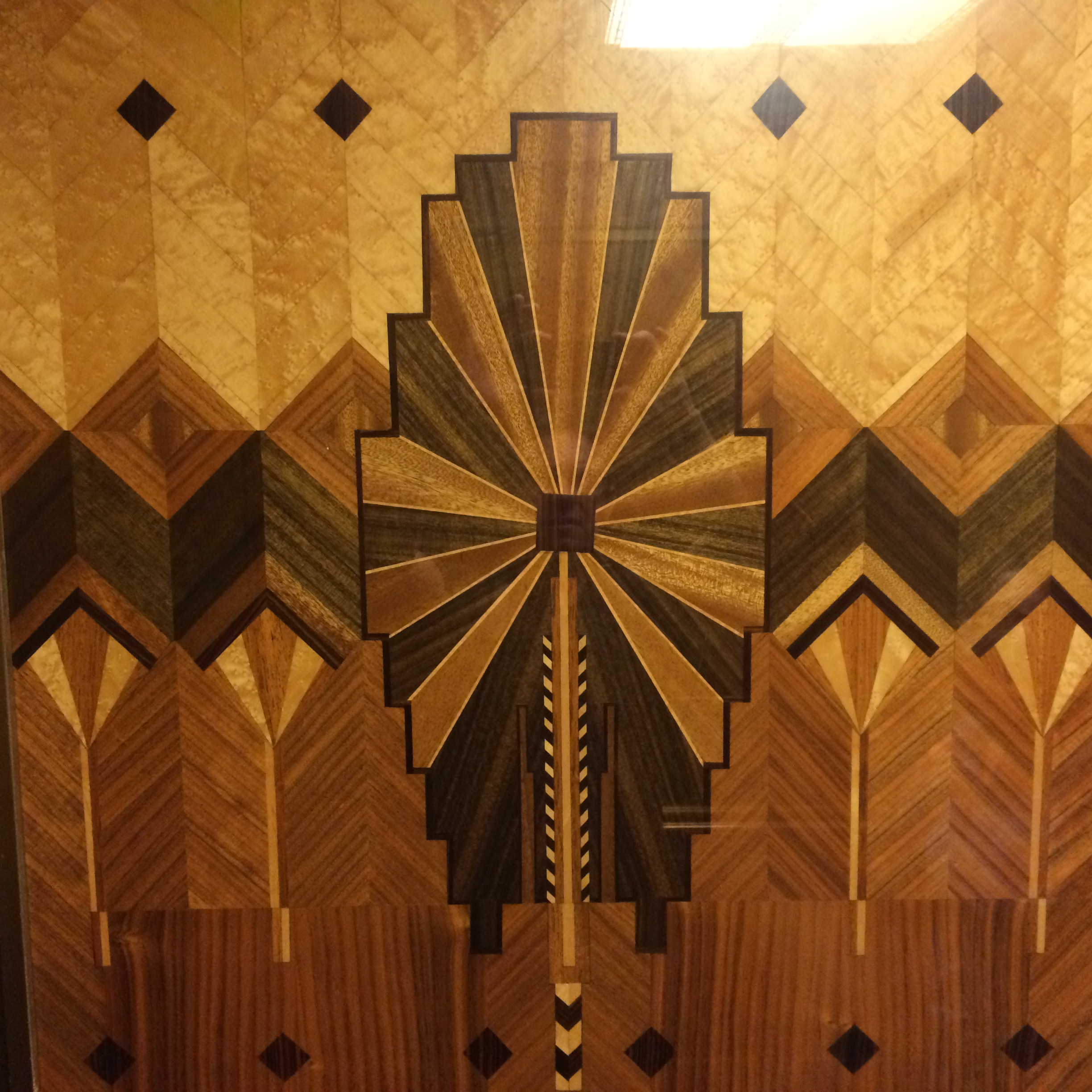 inside the elevator, inlaid walls