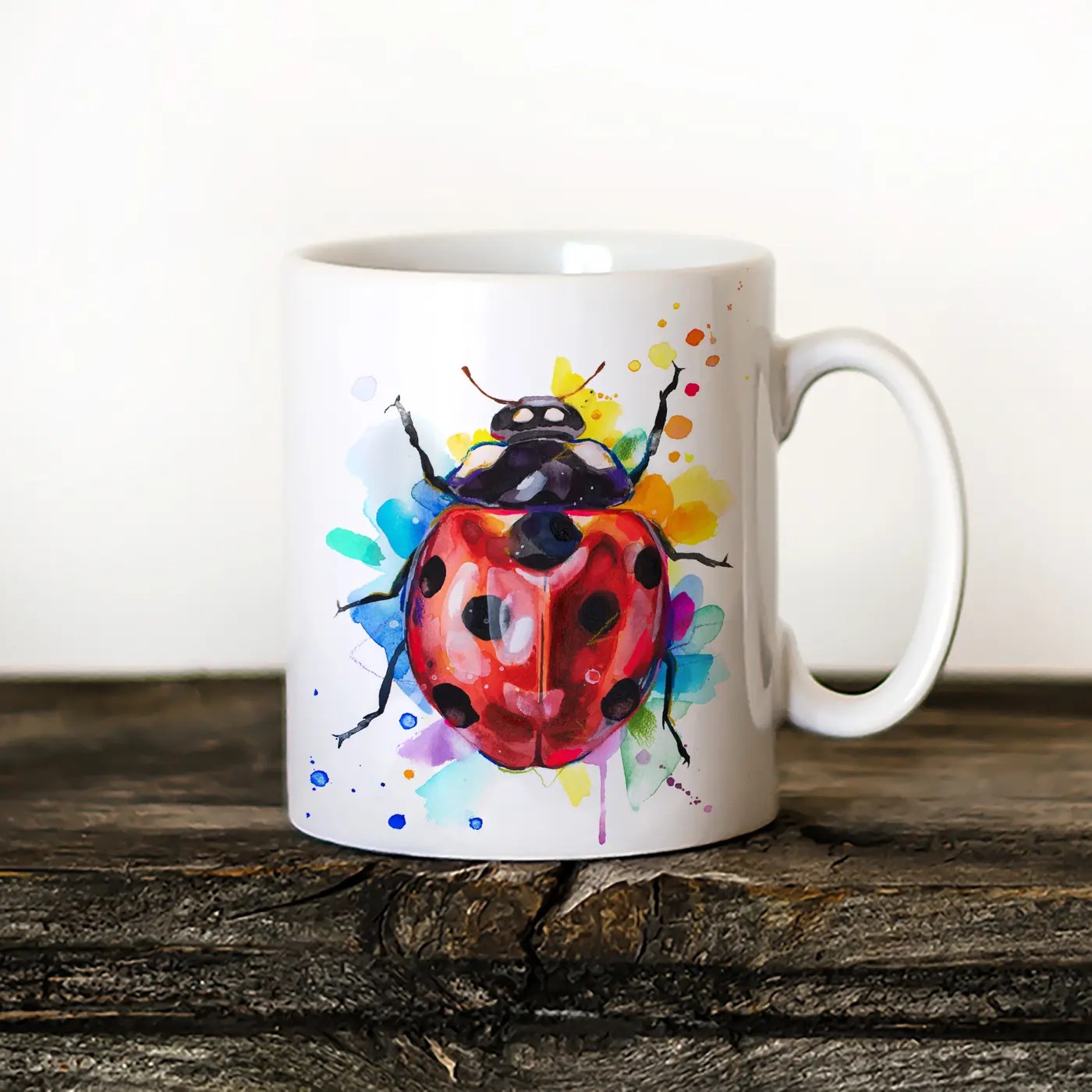 Ladybug watercolor painting printed on an 11 oz ceramic art mug by Slaveika Aladjova